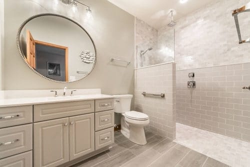 Barrier-free bathroom remodel with safety rods. Spears Design Build Group.