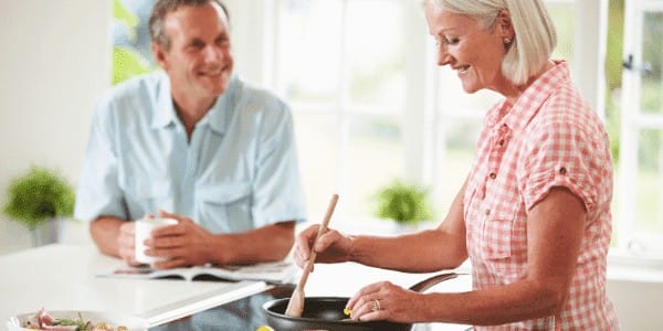 middle aged couple in kitchen