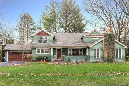 Exterior of a house with a second story addition. Spears Design Build Group.