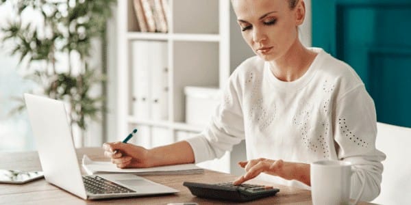 Woman working in her newly remodeled home office.