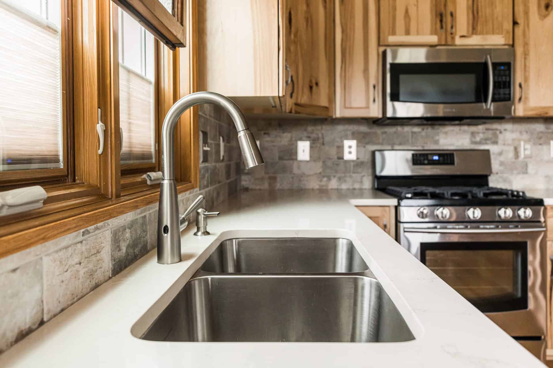 updated sink and tile backsplash