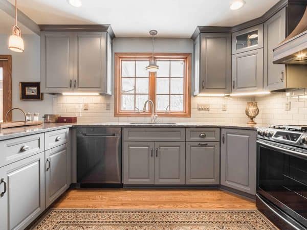 Remodeled kitchen with gray cabinets