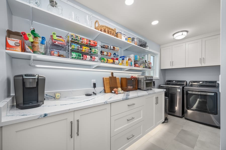 kitchen pantry with laundry room added to it