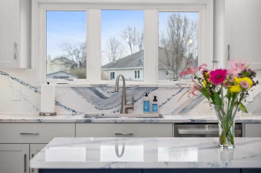 View looking at kitchen sink and faucet.
