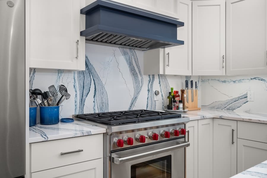 new wolf stove with beautiful blue hood and backdrop