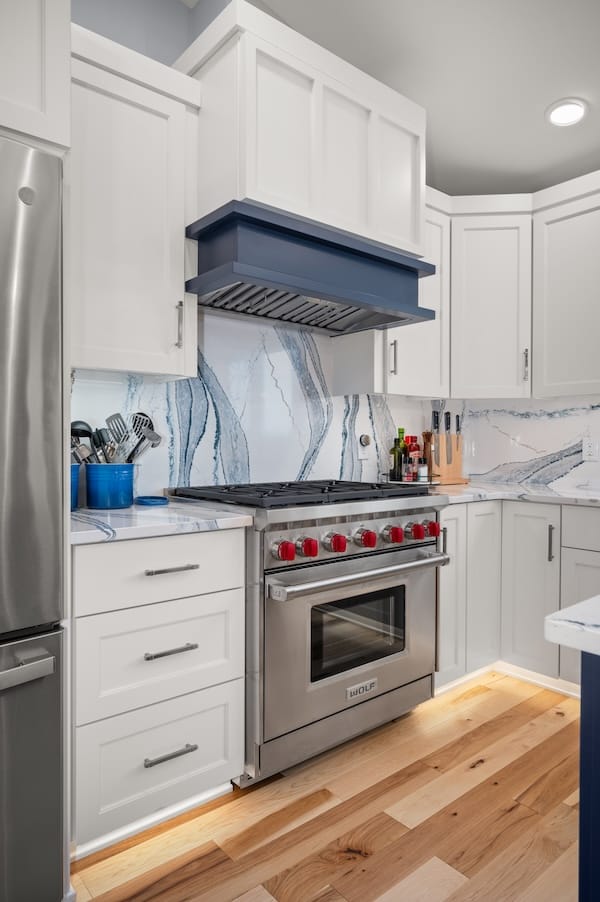 new wolf stove with beautiful blue hood and backdrop